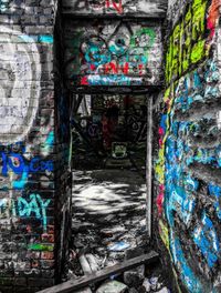 Close-up of graffiti on brick wall