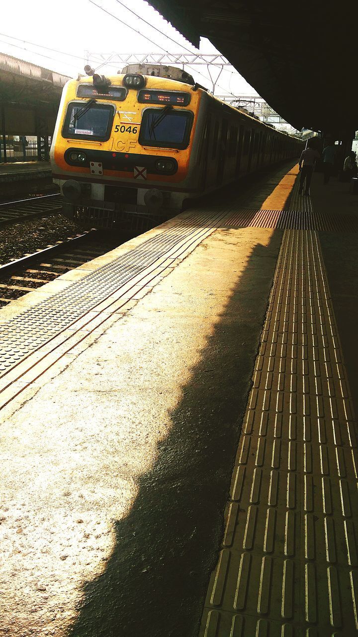 TRAIN ON RAILROAD STATION