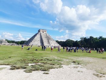 Group of people in front of historical building