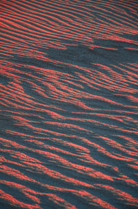 Scenic view of desert against sky during sunset