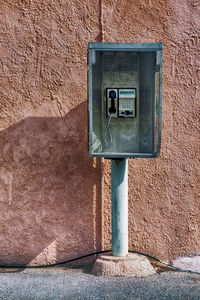 Close-up of mailbox on wall
