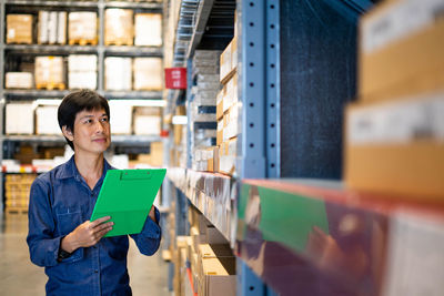 Portrait of woman working in building