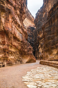 Siq, the narrow slot-canyon that serves as the entrance passage to the hidden city of petra, jordan,