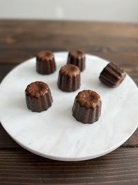 High angle view of mini cakes in plate on table