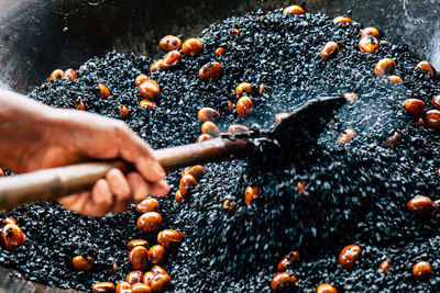 Close-up of person preparing food