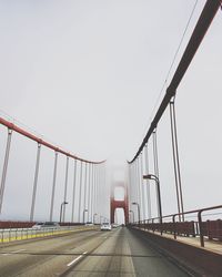 View of suspension bridge against sky