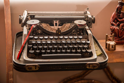 Close-up of typewriter on table