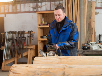 Carpenter working on wood