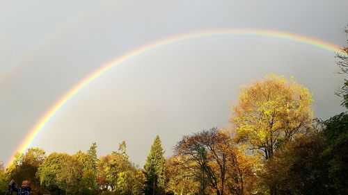 Low angle view of rainbow against sky