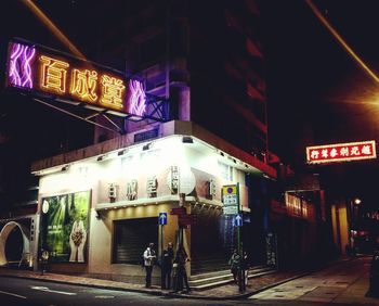 View of illuminated city at night