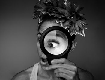 Portrait of man holding flower