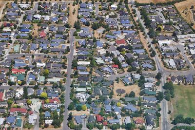 High angle view of street amidst buildings in city