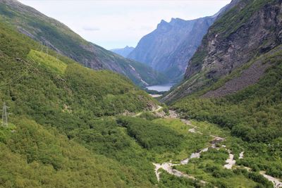 Scenic view of landscape and mountains against sky