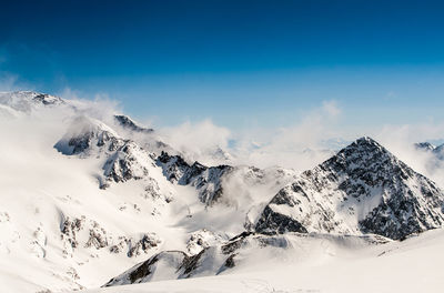 Scenic view of snowcapped mountains