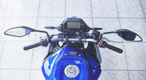 High angle view of motor scooter on tiled floor
