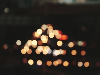 Defocused image of illuminated lights at night