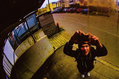 High angle portrait of cute boy standing outdoors