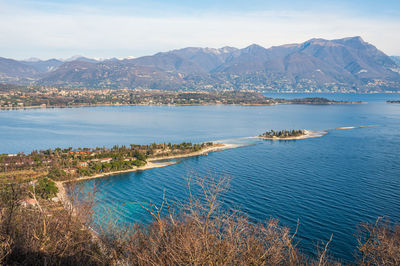 Aerial view of the lake garda with the rabbit island and the garda island from manerba