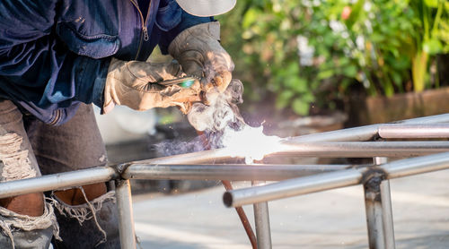 Man working on metal structure