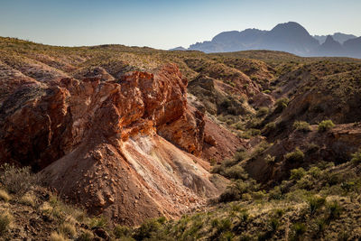 Scenic view of arid canyon landscape against sky