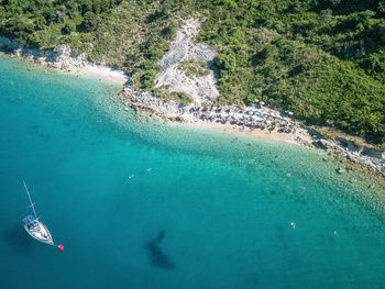 High angle view of sailboat in sea