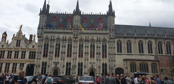 Group of people in front of building