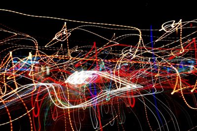 Close-up of illuminated light bulbs at night