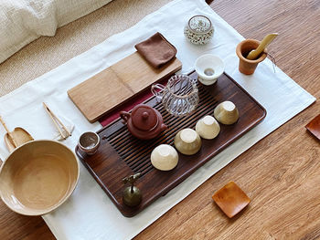 High angle view of coffee cups on table