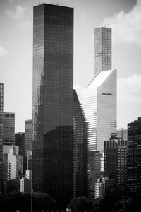 Low angle view of skyscrapers against sky