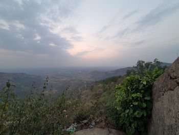 Scenic view of landscape against sky during sunset