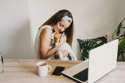 Young woman using mobile phone