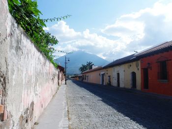 Road with buildings in background