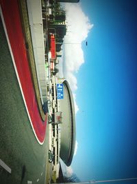 Cars on road against sky