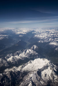 Aerial view of dramatic landscape against sky