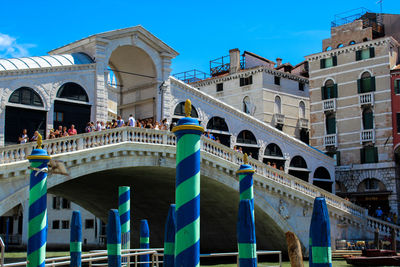 View of buildings against blue sky