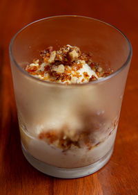 Close-up of ice cream in glass on table