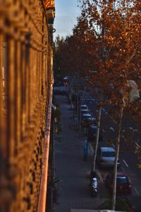 Close-up of cars on road against sky