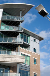 Low angle view of modern building against sky