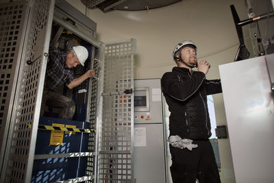 Engineers working in wind turbine