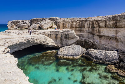 View of rocks and rock formations against sky