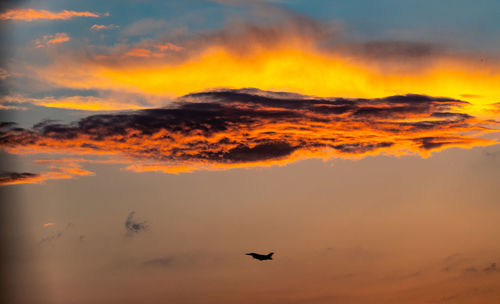 Scenic view of orange sky