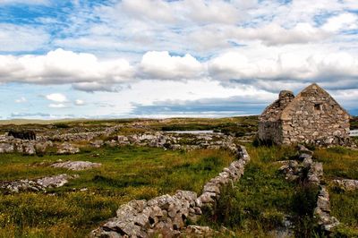 View of landscape against cloudy sky