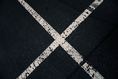 High angle view of road sign on street