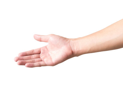 Close-up of human hand against white background