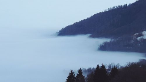 Scenic view of snow covered mountains