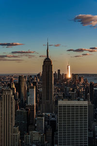 Cityscape against sky during sunset