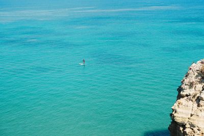 High angle view of rocks in sea