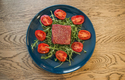 High angle view of salad in bowl on table