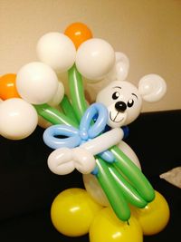 High angle view of multi colored balloons on table