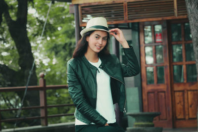 Outdoor portrait of a young beautiful fashionable happy lady posing in the street of the city shimla